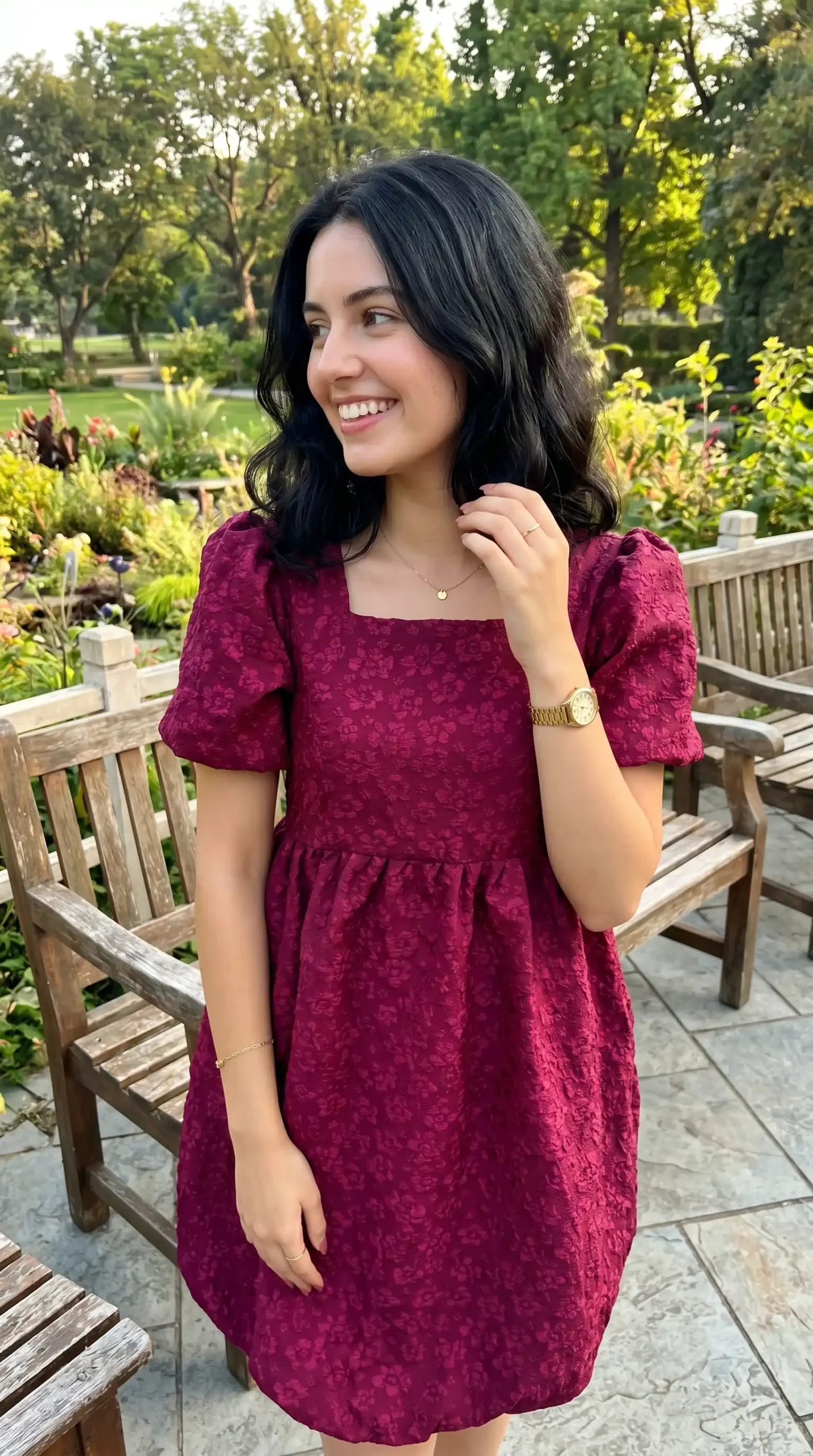 Woman wearing wine red floral jacquard puff sleeve square neck babydoll mini dress in garden in summer