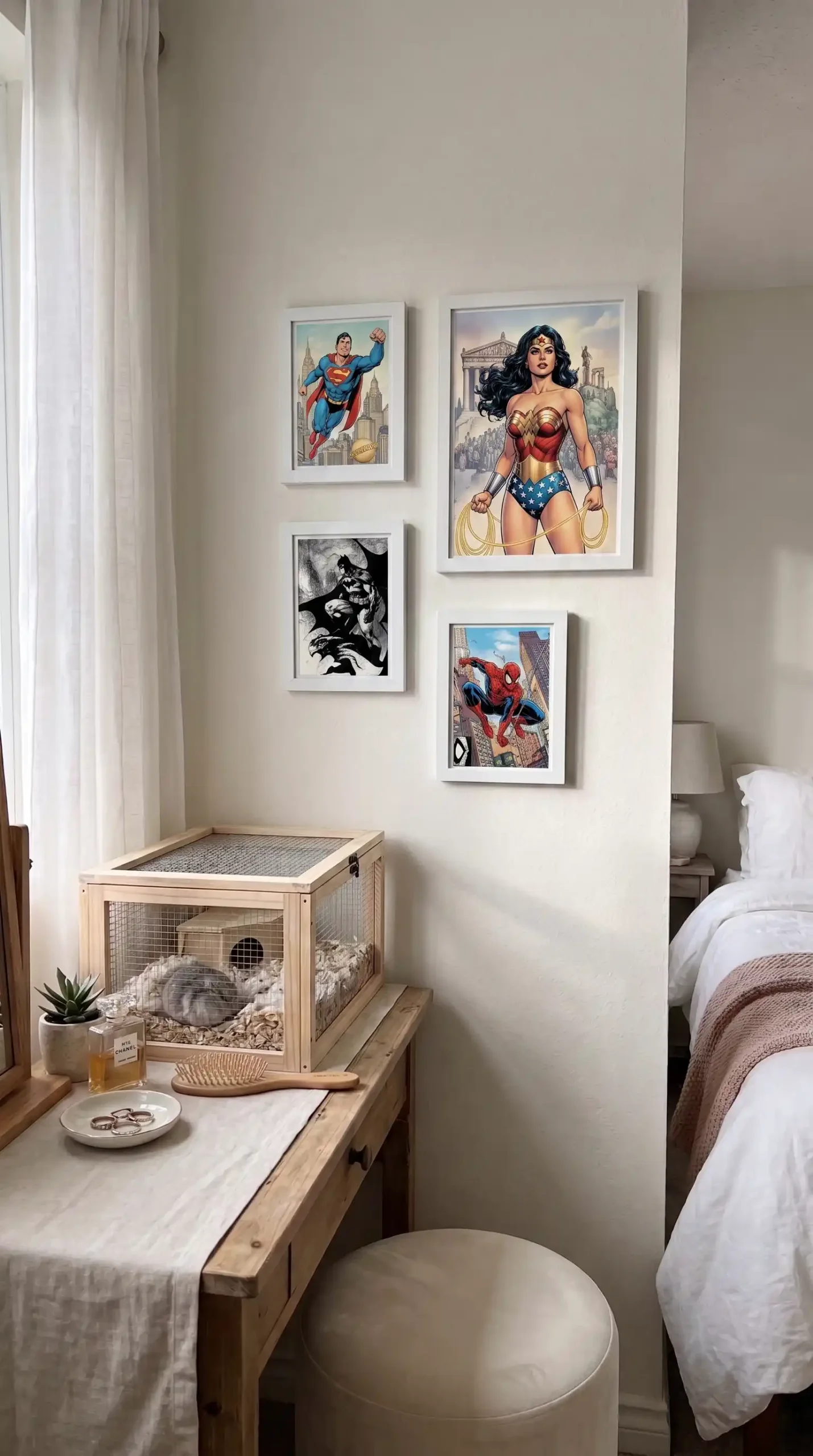 Three white framed botanical prints and small oval mirror in loose cluster on white bedroom wall